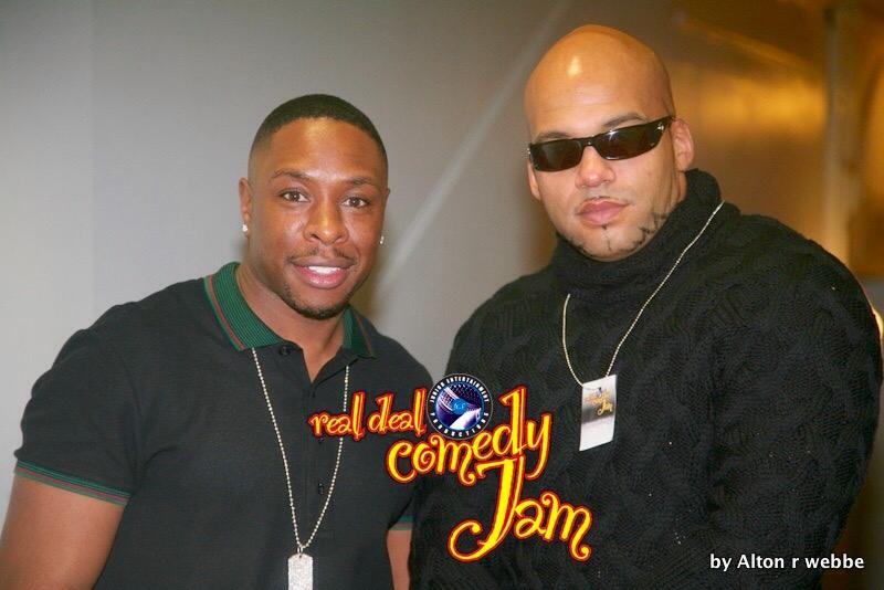 Comedian and host together at a live comedy show