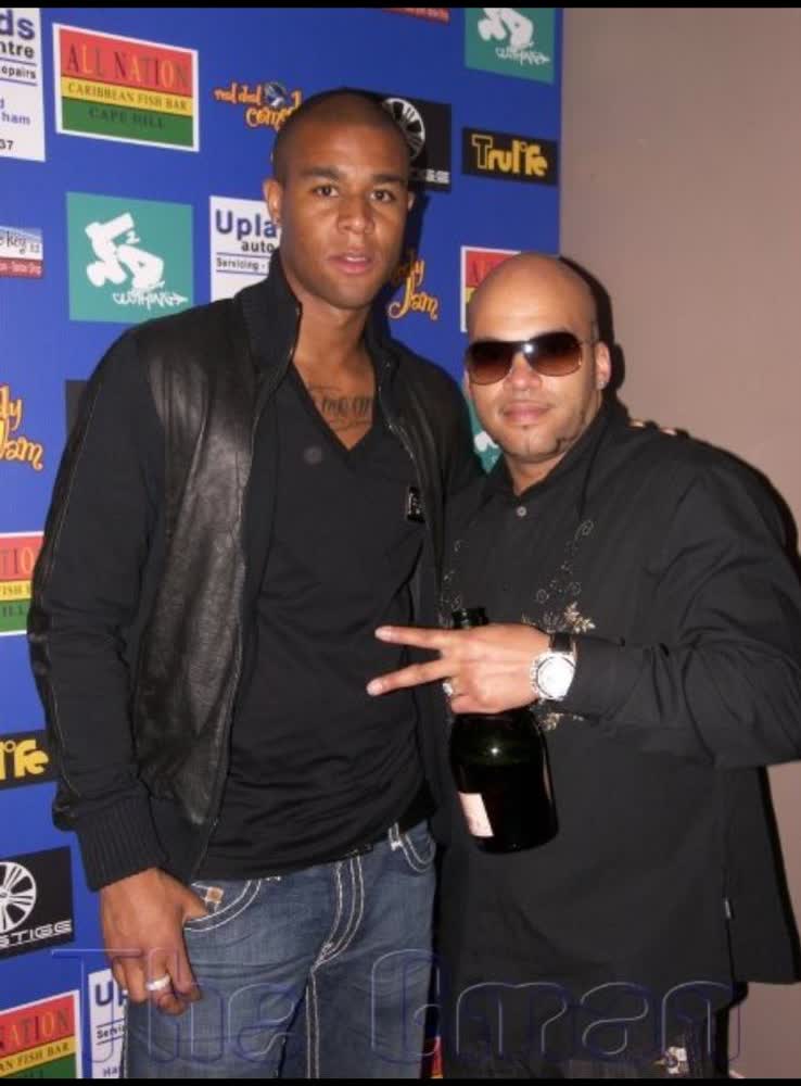 Guest and host at a live event photo wall